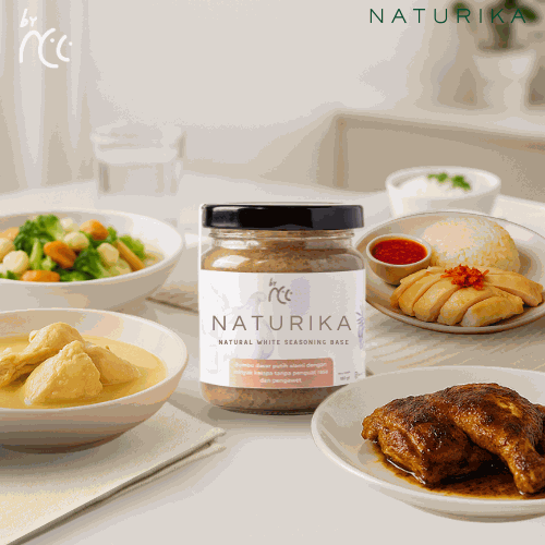 By NCC Naturika Bumbu Dasar Putih 160gr jar with prepared dishes on table