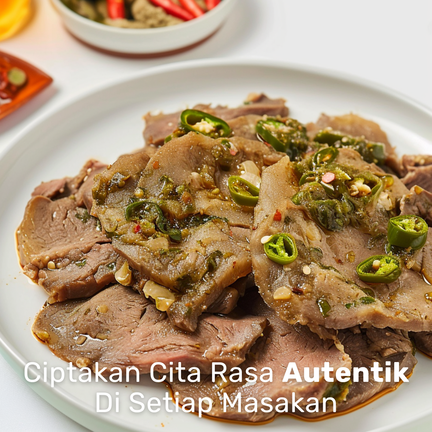 Sliced meat dish garnished with green chili and Bumbu Dasar Hijau By NCC sauce on white plate
