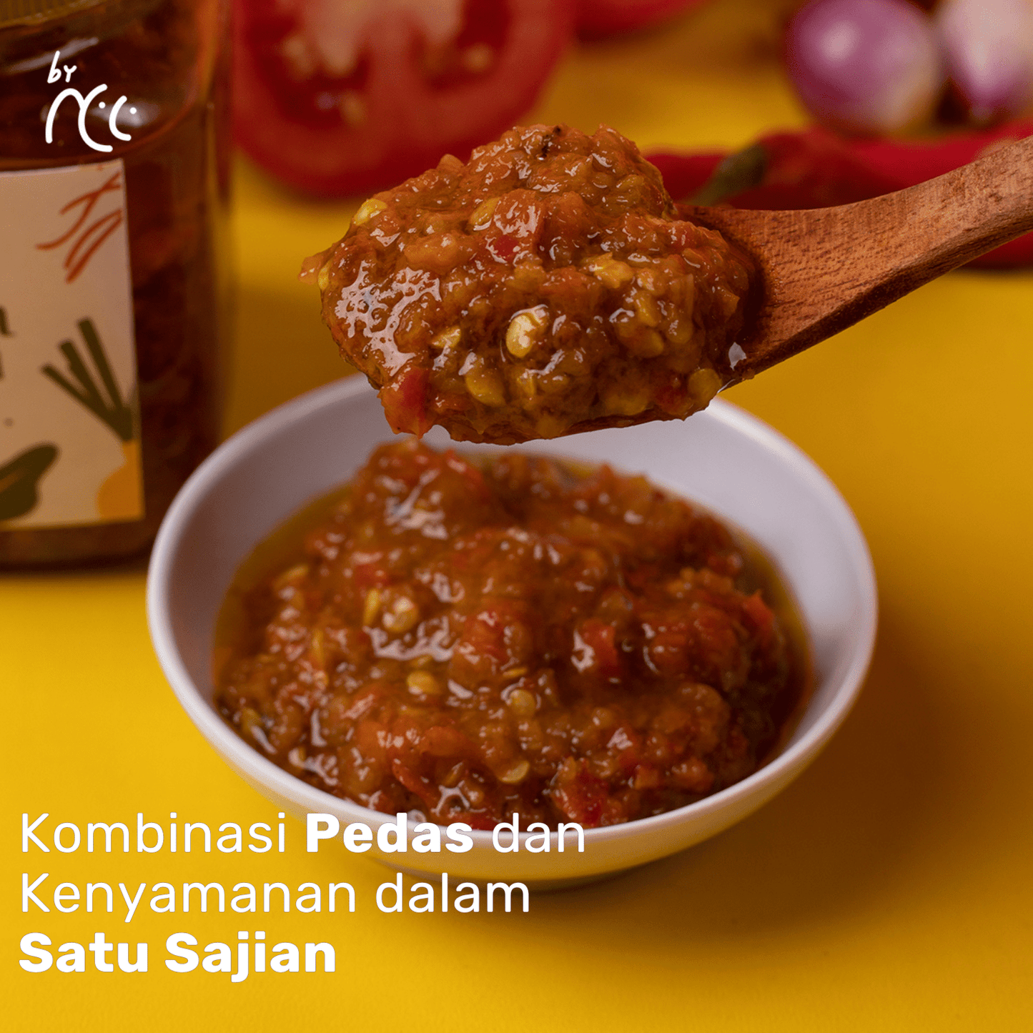 By NCC Sambal Terasi Pedas Gurih Rumahan Ulek Lalap Goreng Khas Sunda in bowl with wooden spoon close-up