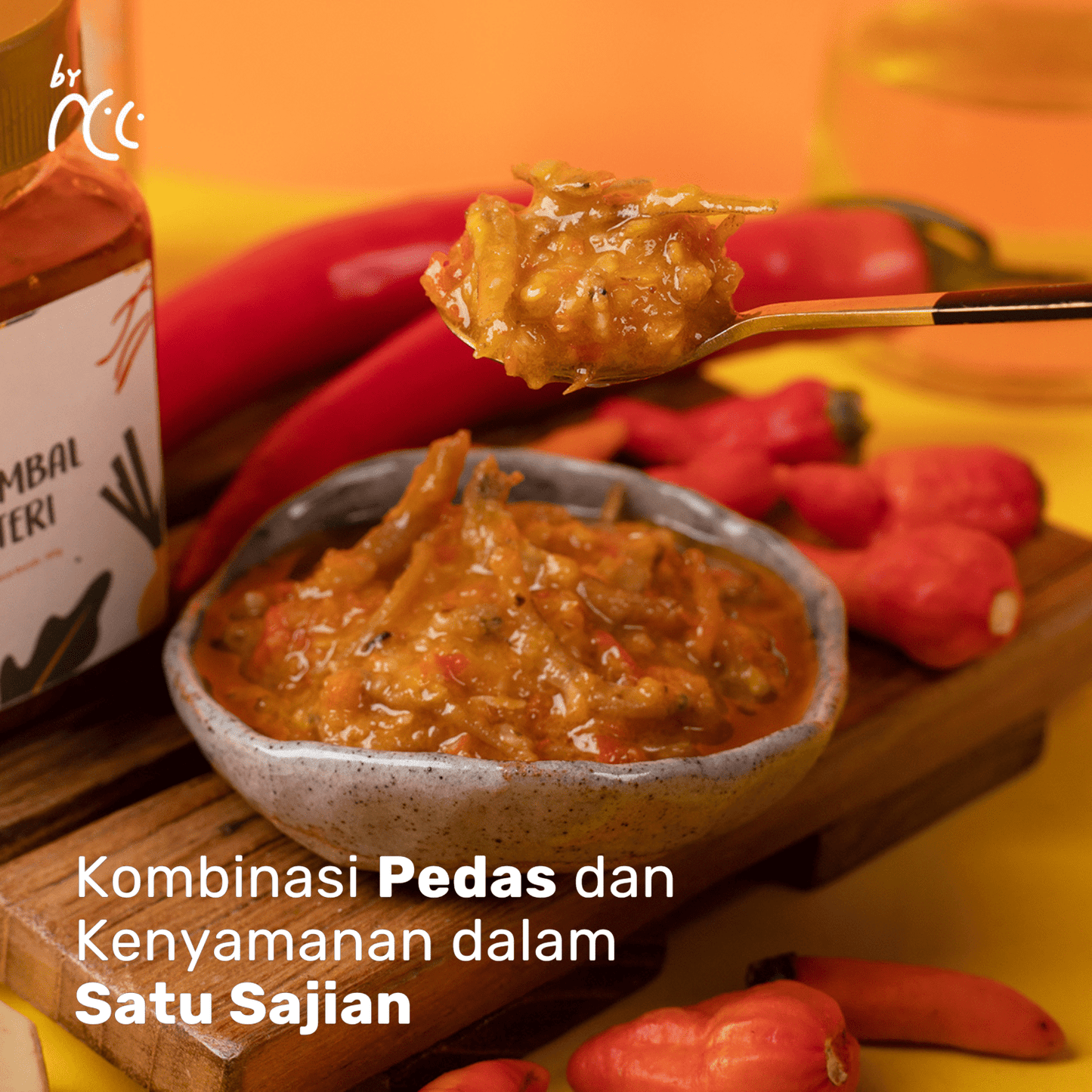 By NCC Sambal Teri Gurih Pedas Rumahan spicy savory Medan anchovy chili sauce jar and bowl with chili peppers