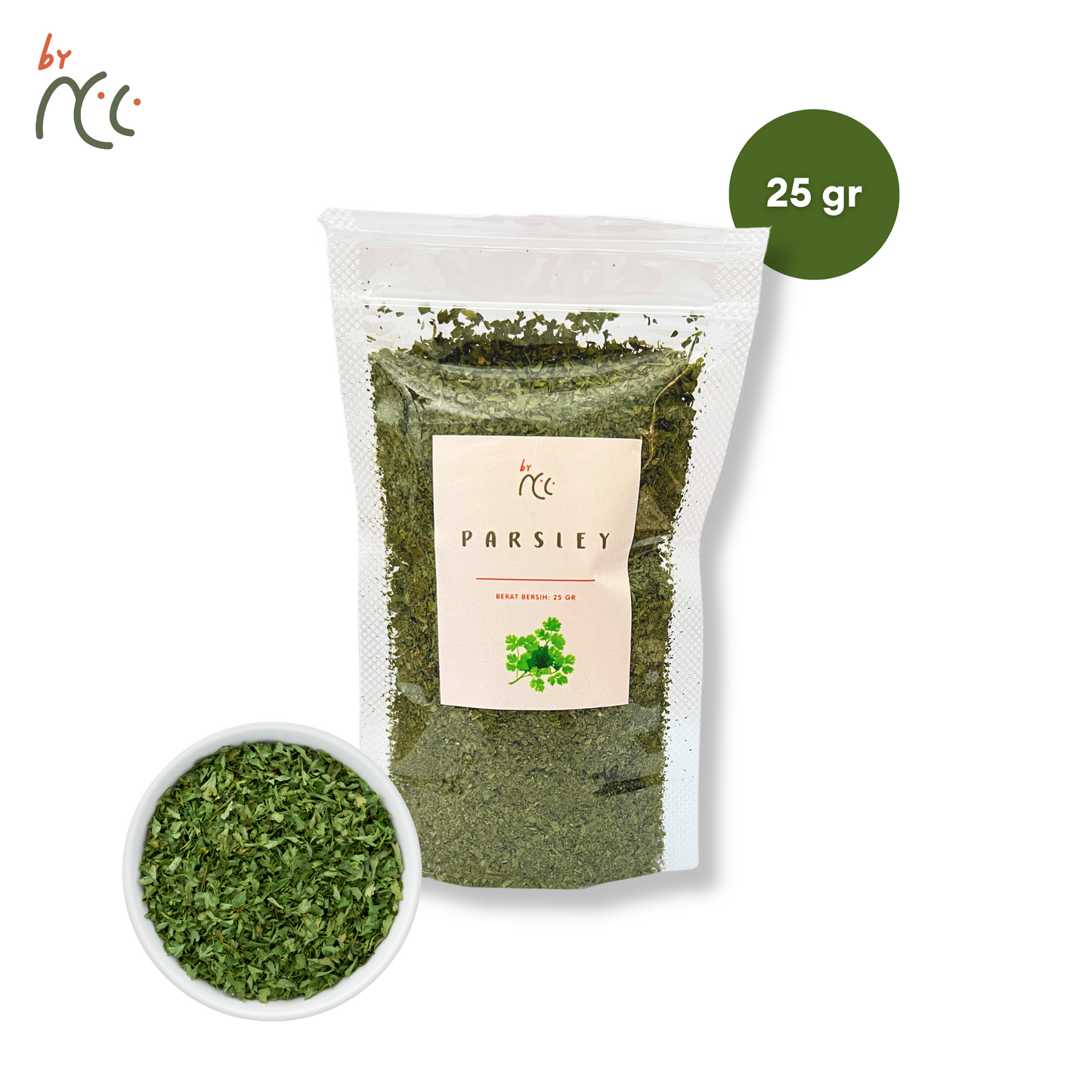 By NCC Bubuk Kering Tabur Rempah Parsley 25gr packet with dried parsley flakes in a bowl.