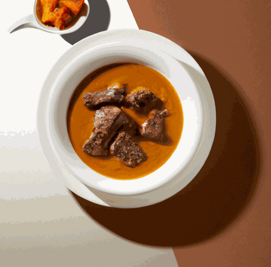 Resep autentik semur daging dengan bumbu dasar putih by NCC served in a bowl
