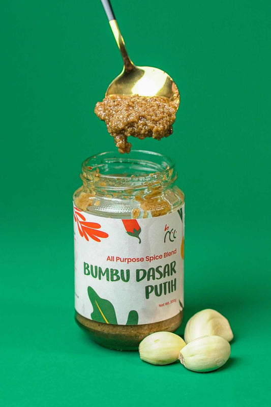 Close-up of Bumbu Dasar Putih, a traditional Indonesian white seasoning with garlic, shallots, and ginger ingredients